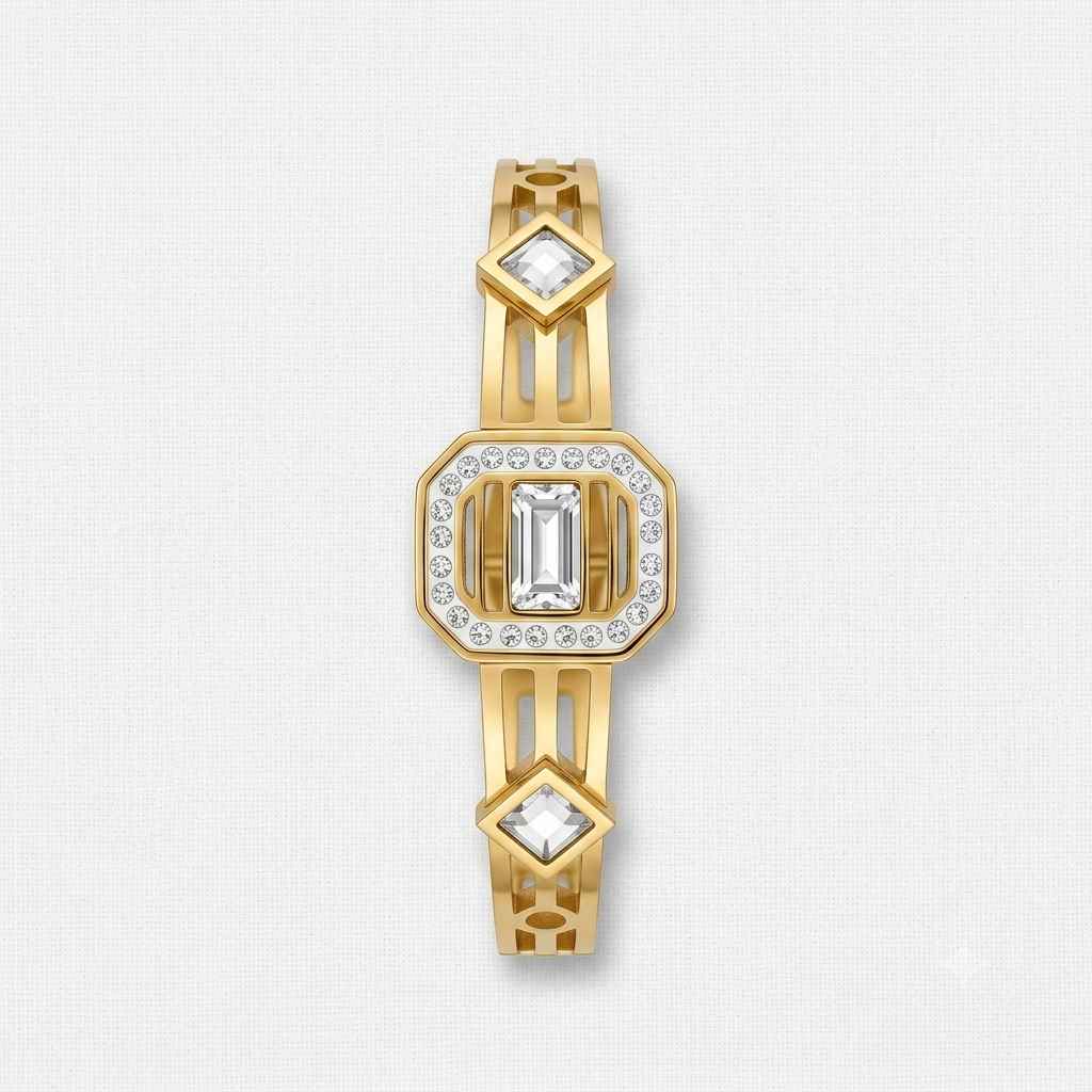 A gold bracelet watch featuring a central octagonal bezel with a large emerald-cut clear stone surrounded by a halo of small round stones, with matching diamond-shaped clear stones at the top and bottom of the link chain, set against a light gray textured background.