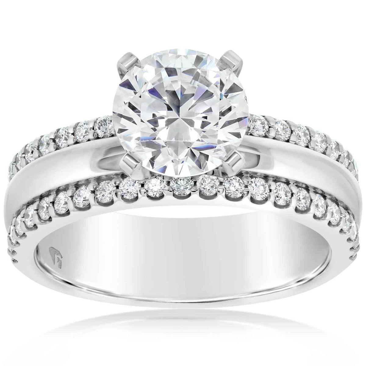 Diamond ring with a large central gemstone and smaller diamonds on the band against a white background