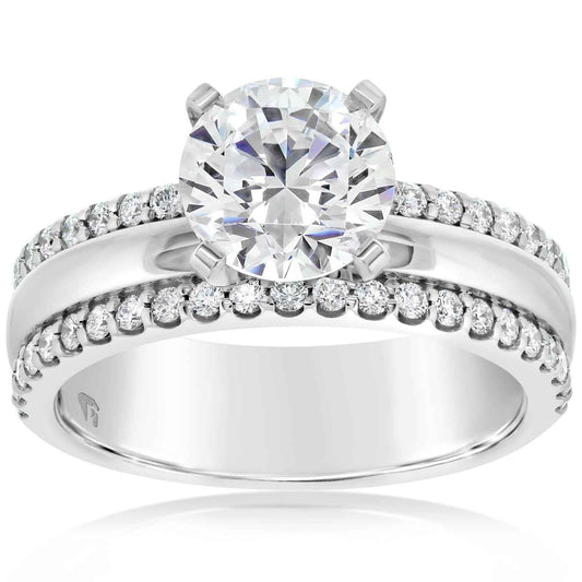 Diamond ring with a large central gemstone and smaller diamonds on the band against a white background